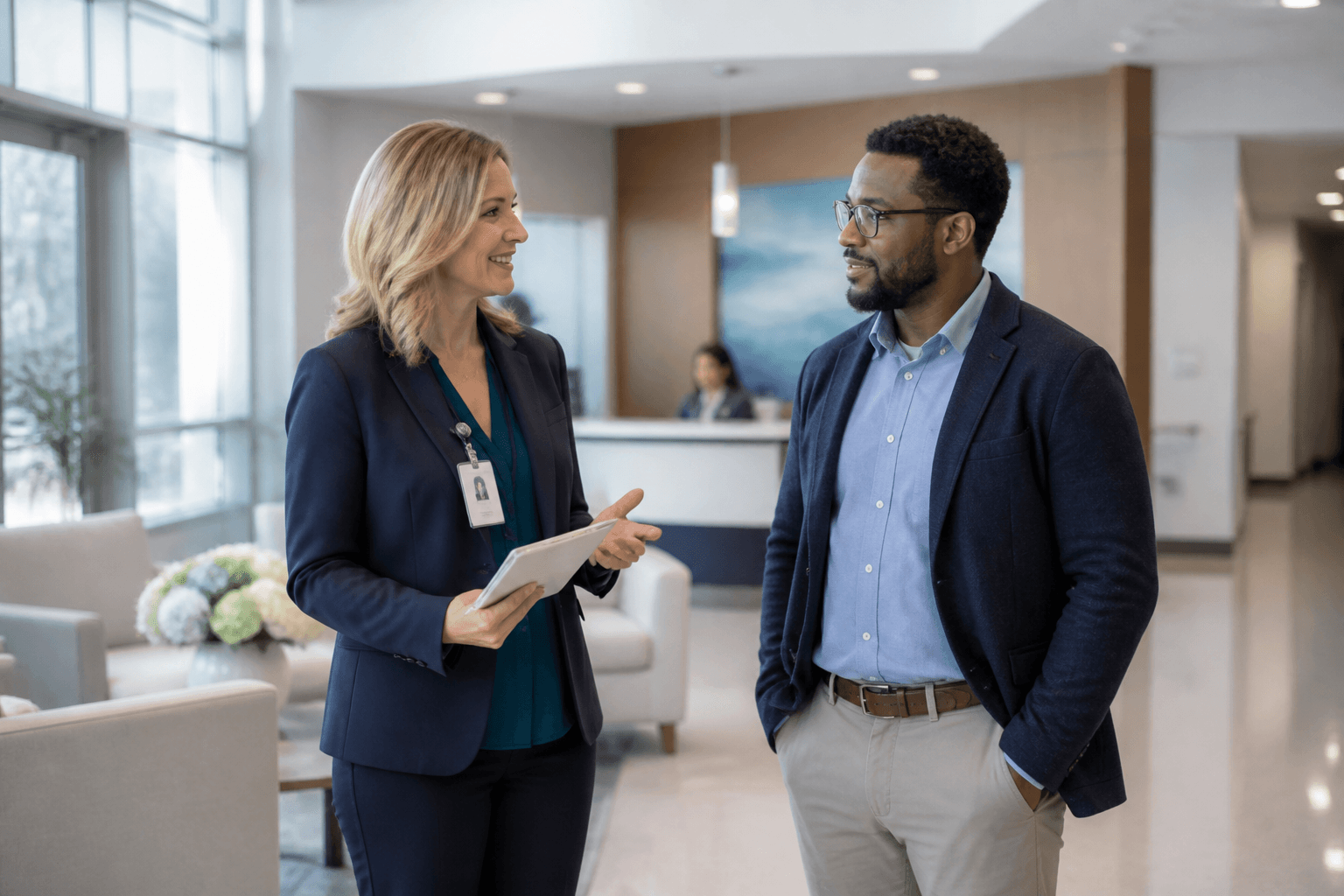 Healthcare professionals meeting in a modern clinic lobby